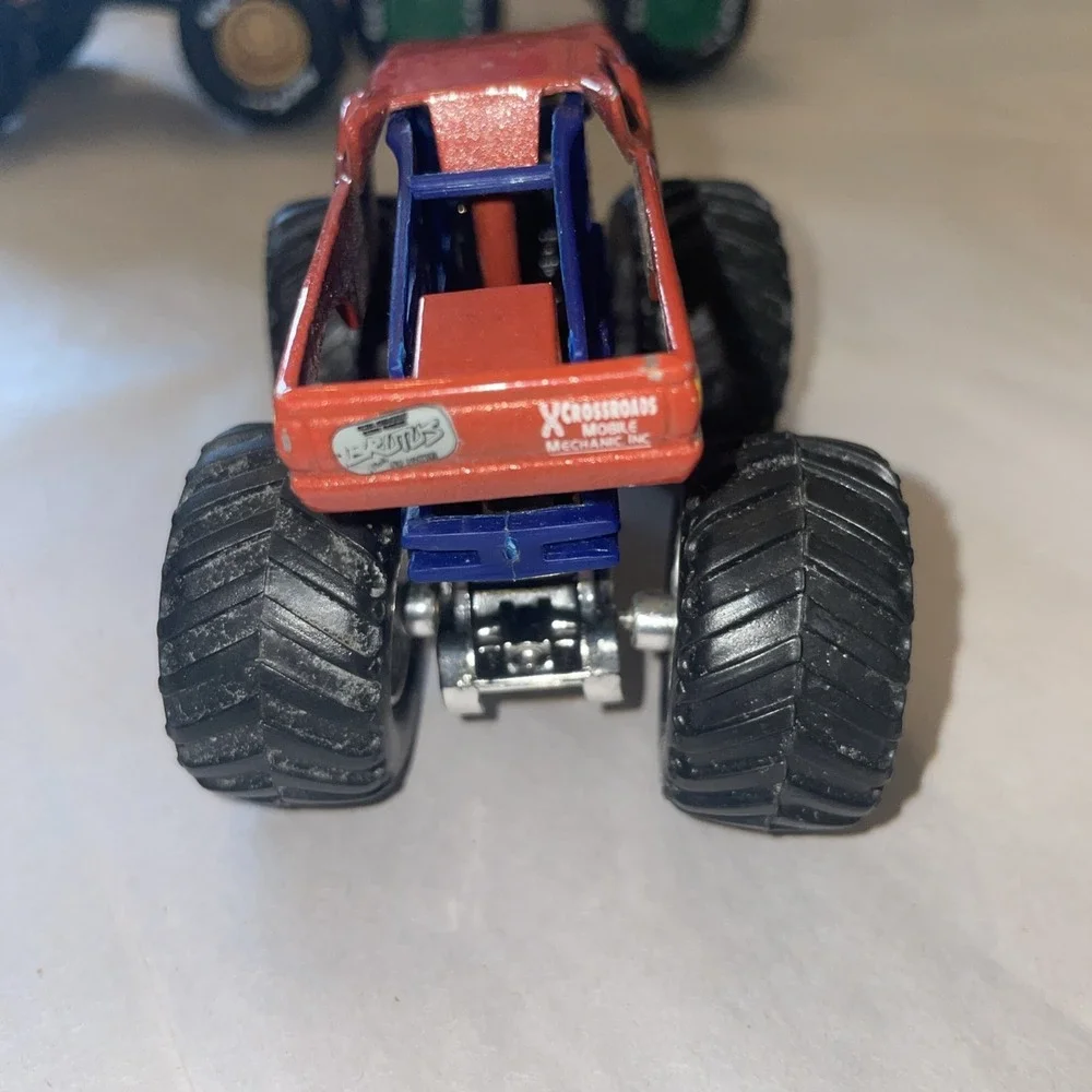 Four Monster Truck Metal Body Diecast 1:64